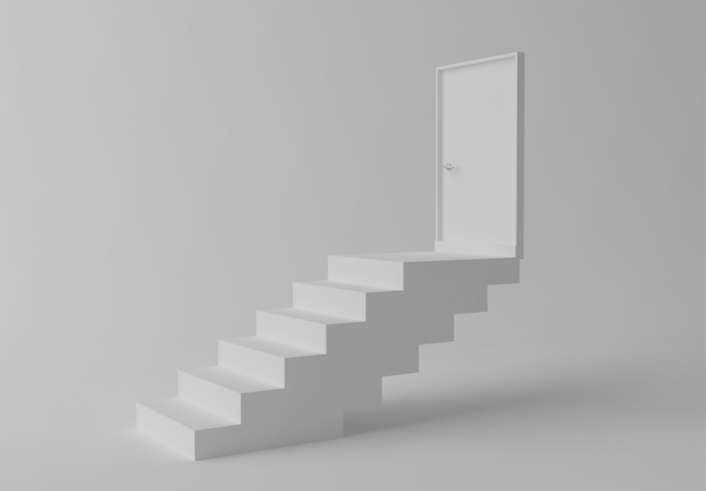 A set of stairs leading to a door.