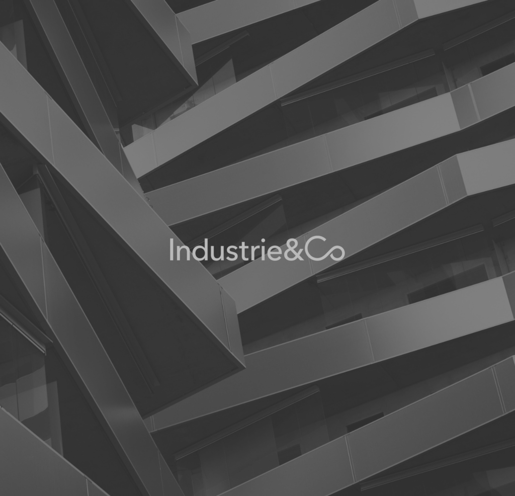 Industries & Co logo on top of an abstract pattern.