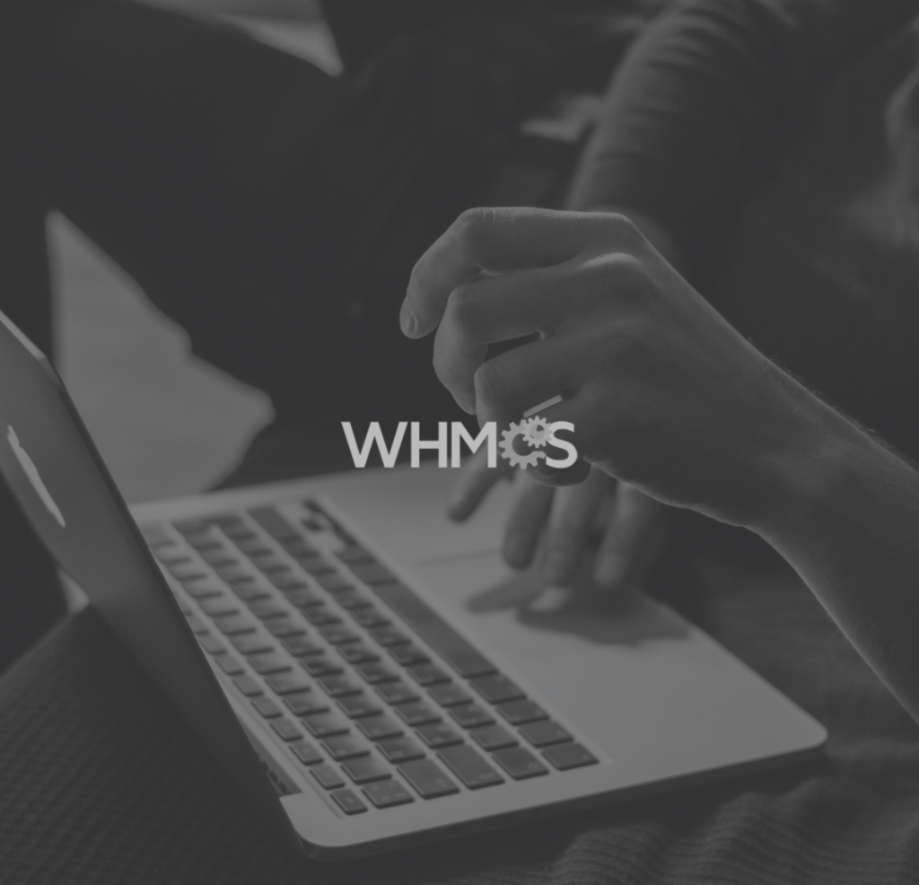 The WHMS logo on top of a person using a laptop.